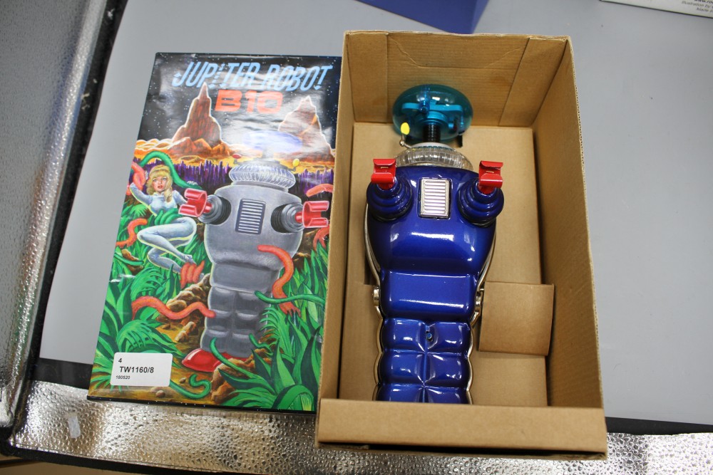 Four collectors robots, various, including a Rocket Toys R-1, two battery-operated ME 100 Space Walk Man (one black, one blue) and a